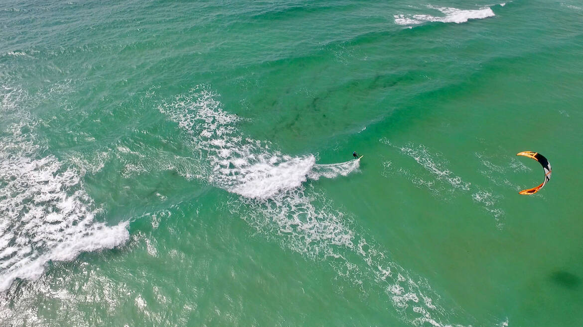 Riding the waves in Pays Bigouden © Air Pixel Concept